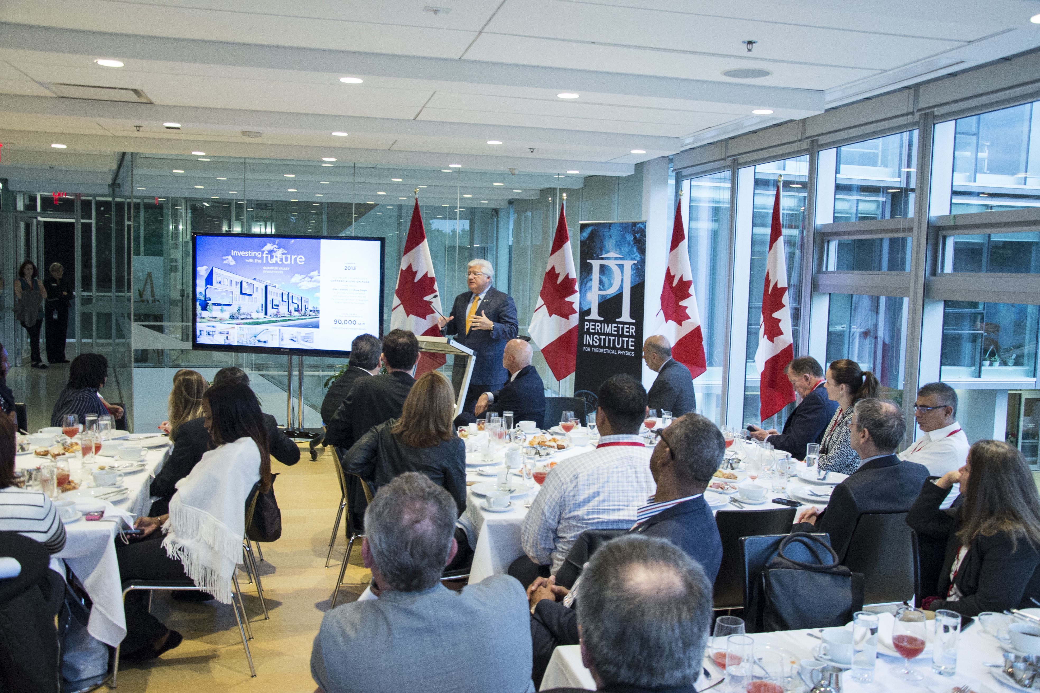 Mike Lazaridis giving a keynote presentation to the ACE delegates