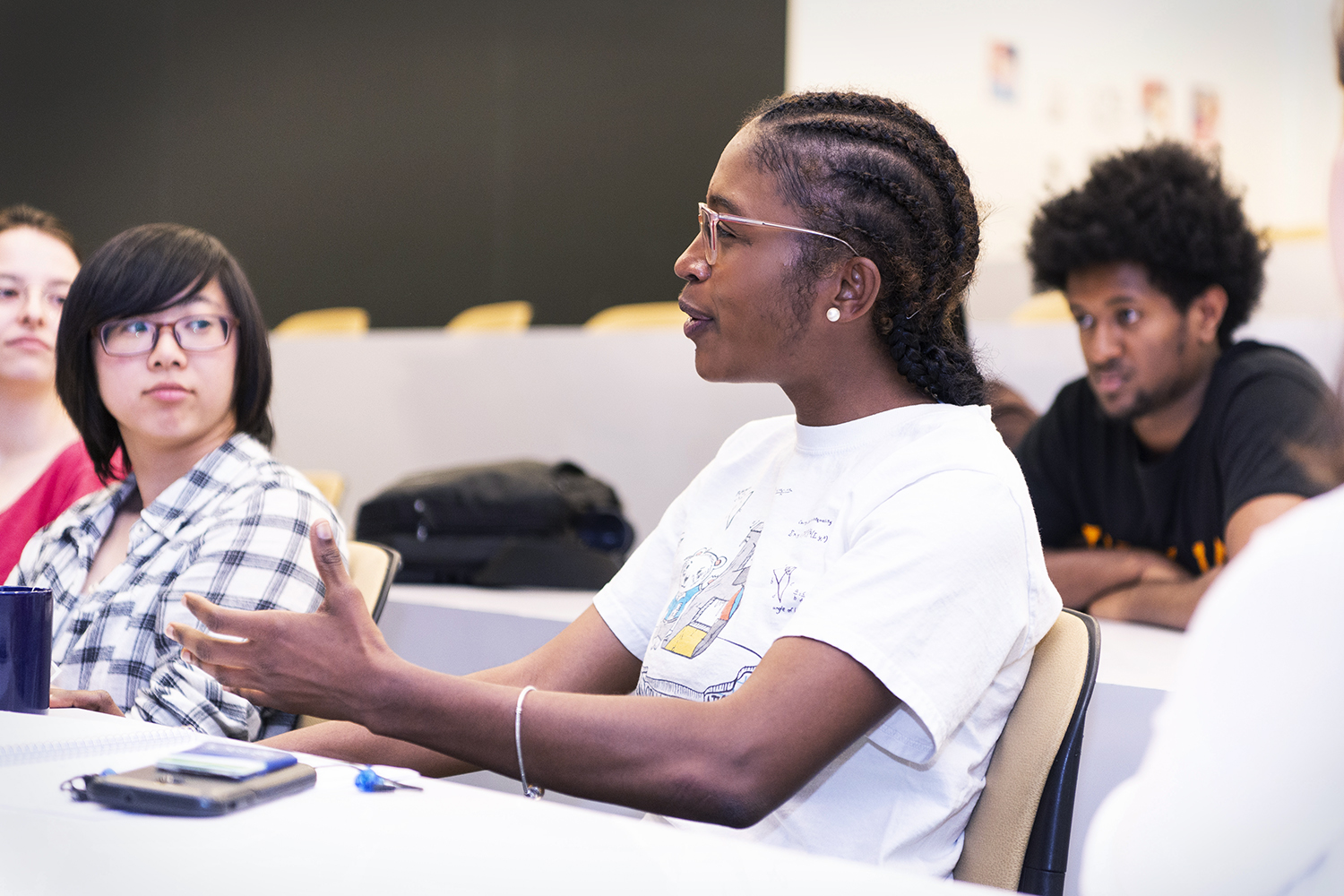 Student Alicia Lima asking a question in class