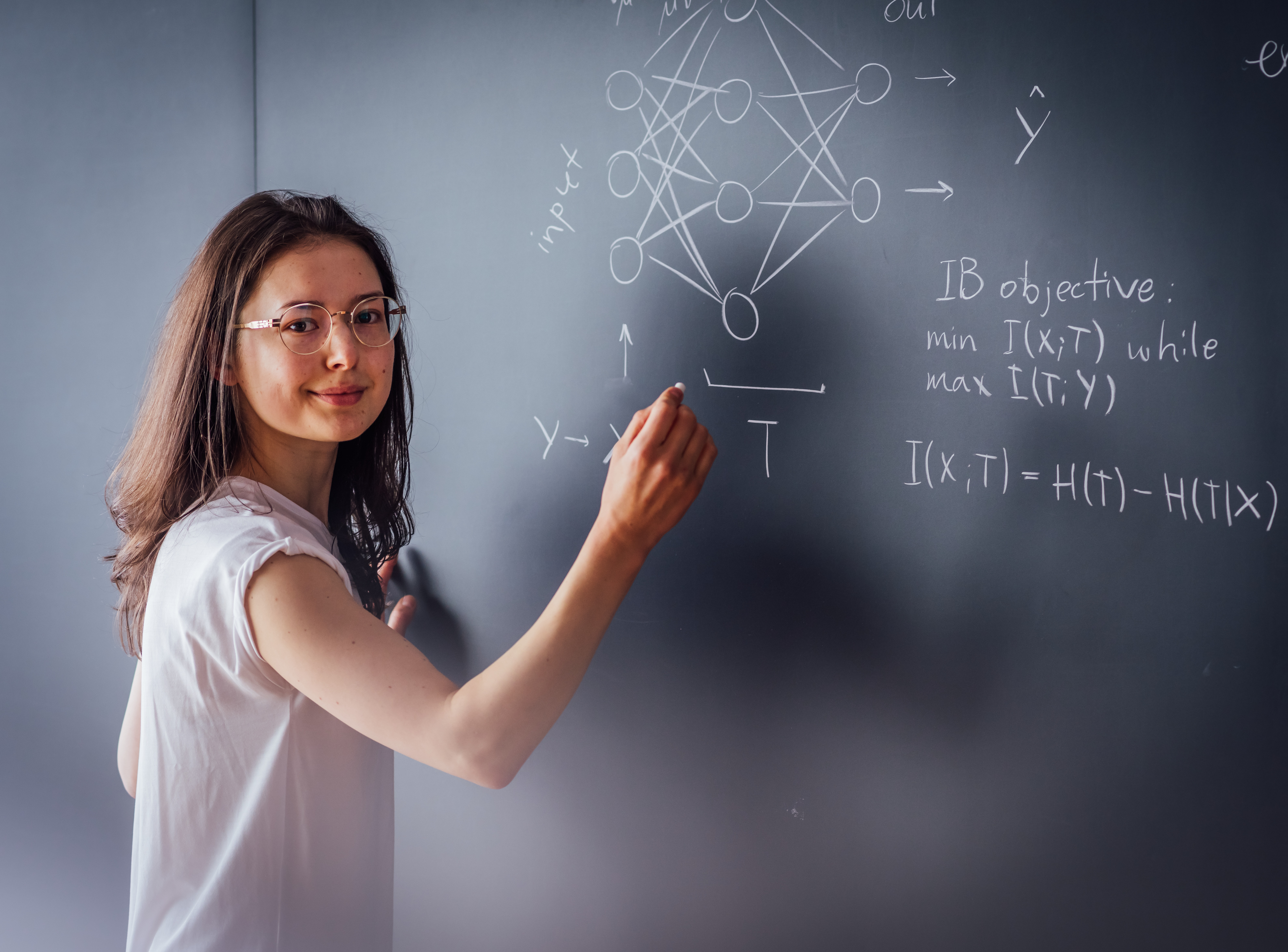 Anna Golubeva in front of a blackboard