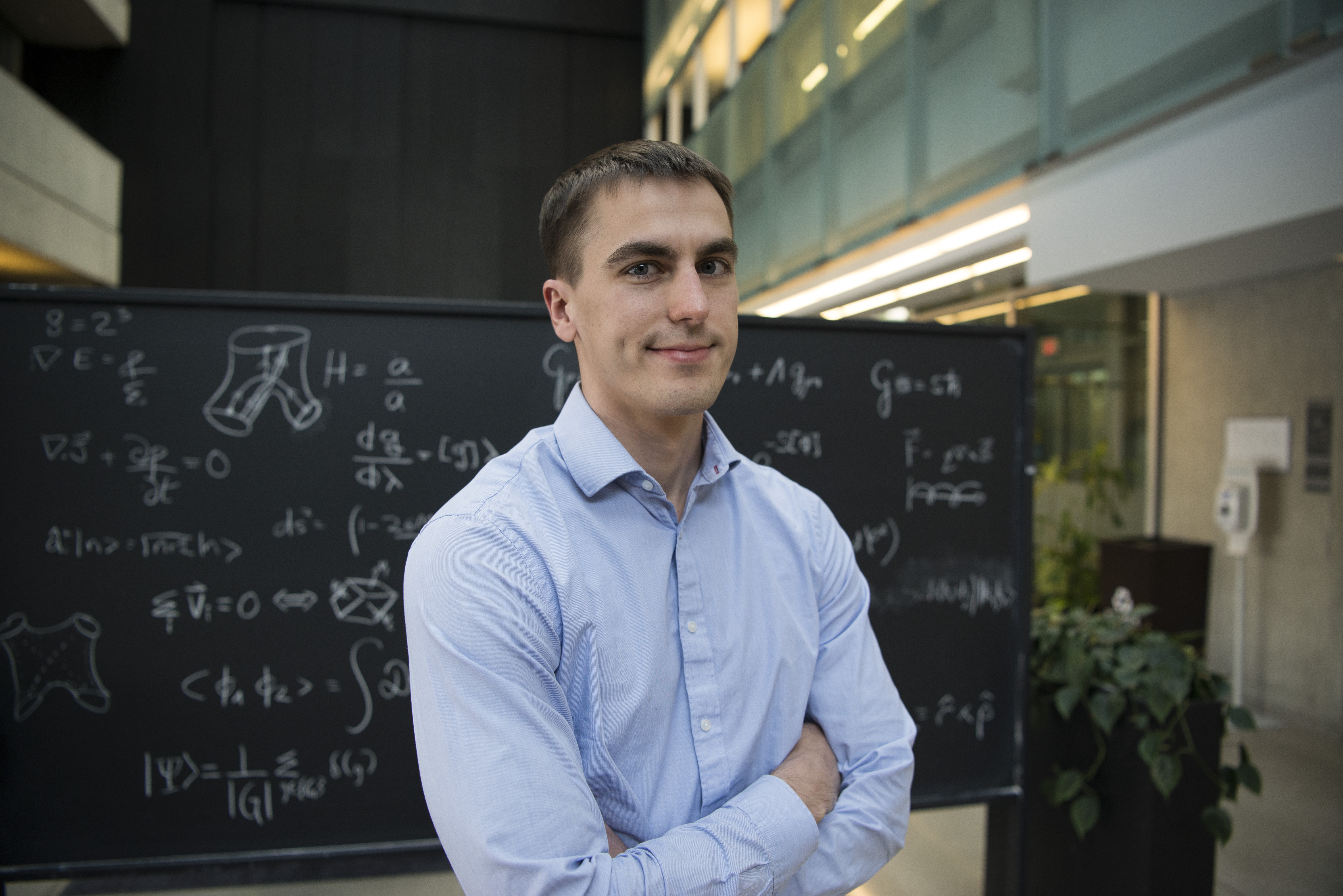 Portrait of William East in the Atrium at Perimeter Institute