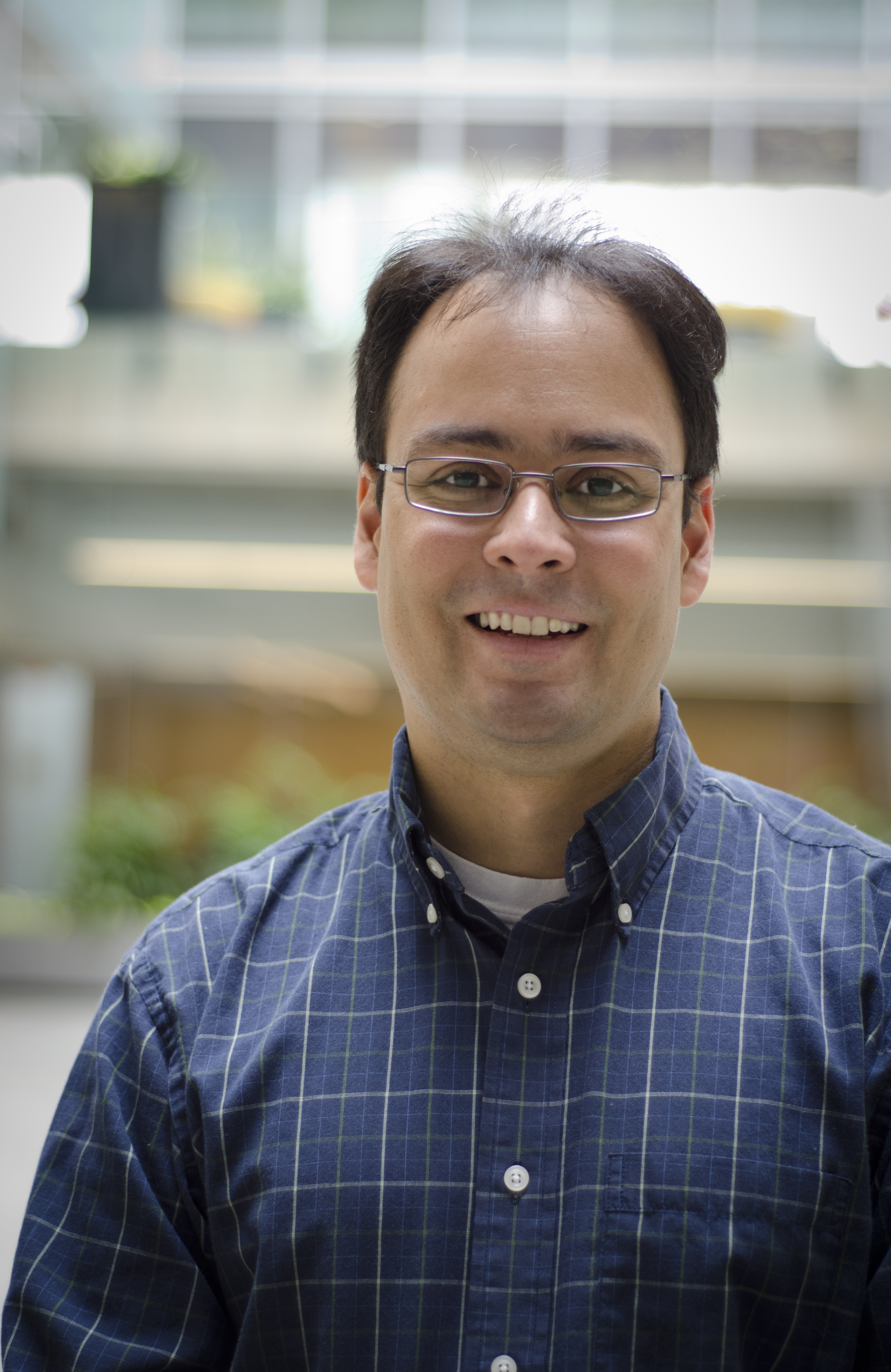 Portrait of Freddy Cachazo in Perimeter Institute's atrium