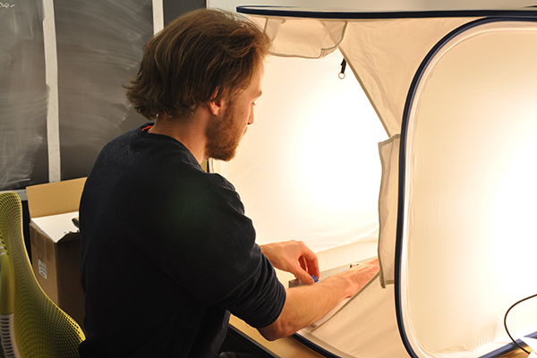 Henry Reich working on a light experiment