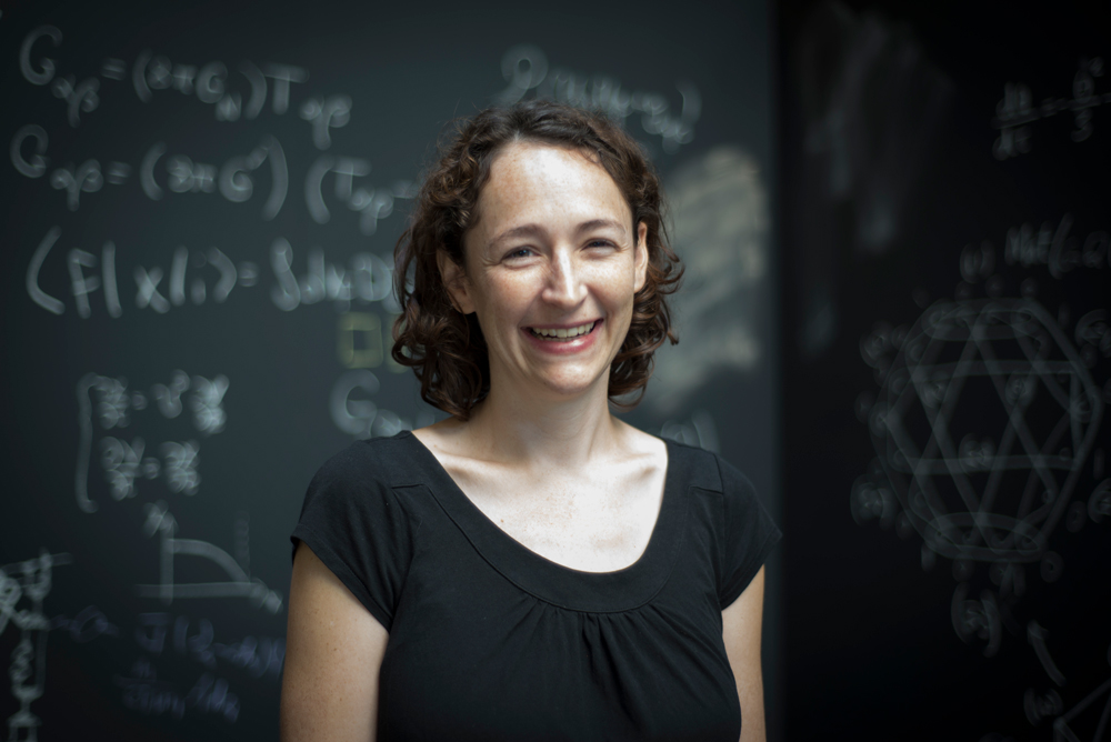 Portrait of Sarah Shandera with chalkboards in the background