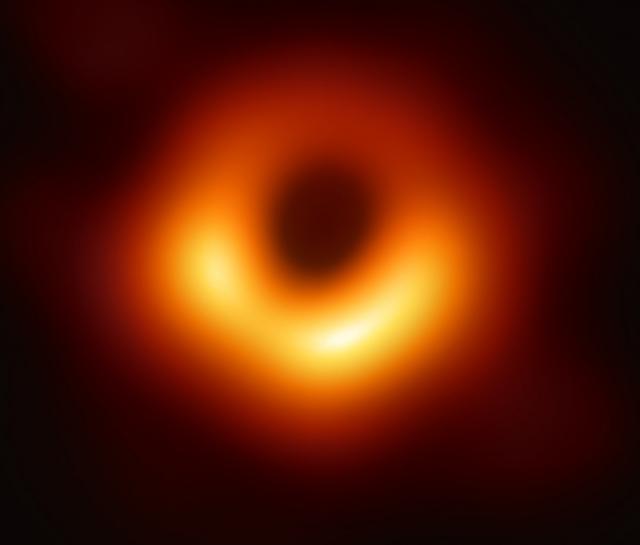 Scientific image of black hole on black background