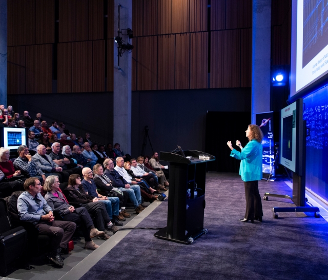  Gabriela Gonzales giving a public lecture