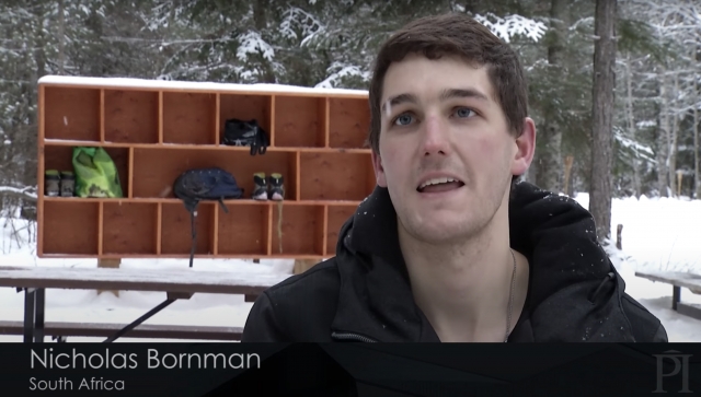 Man being interviewed outside in the snow