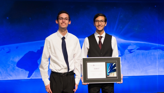 Young man receiving an award