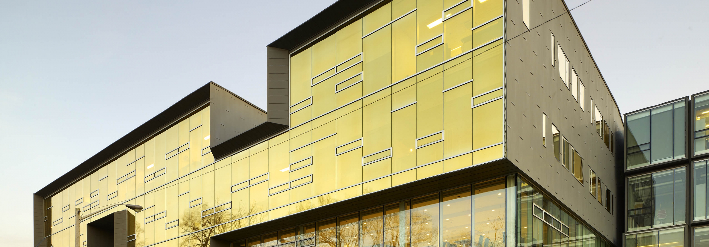 Perimeter Institute building, golden facade, Credit Tom Arban