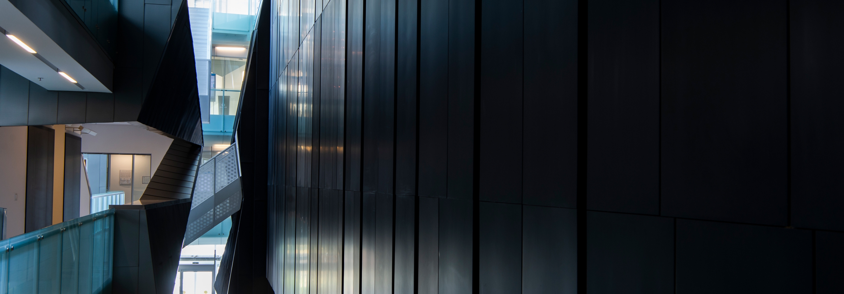 Interior spine of building with hallways and angled walls