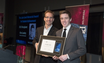 Alexander Landry receiving his award from the hands of Greg Dick 