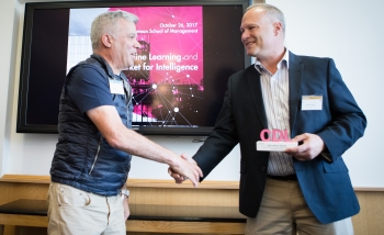 Perimeter’s Director of Academic Programs, James Forrest, receiving the CDL “Labour” award