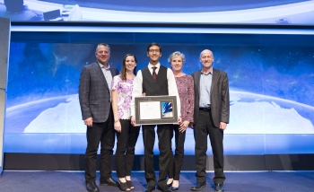 Graeme Ko posing with his award