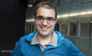 Portrait of 2017 Sackler Prize winner Pedro Vieira in Perimeter Institute's atrium