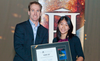 Sherry Chu receiving her Luke Santi Memorial award from Greg Dick, Perimeter's Director of Outreach