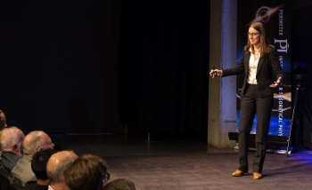 Phiala Shanahan giving a public lecture at Perimeter Institute