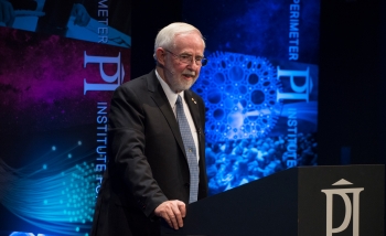 Man speaking on stage 