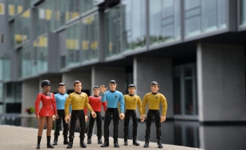 Startrek figures infront of PI backround