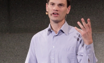 Man speaking on stage 