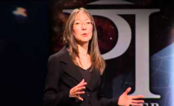 Woman speaking on stage 